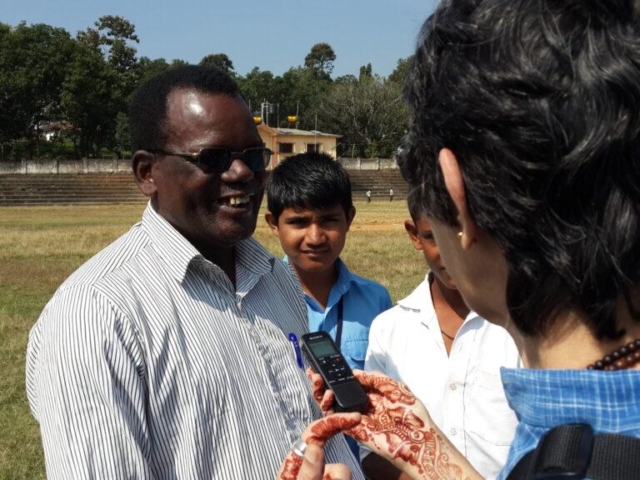 siddi leader being interviewed